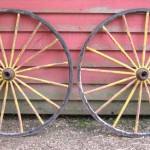 Two Early Painted Wood and Metal Wagon or Fire Engine Wheels